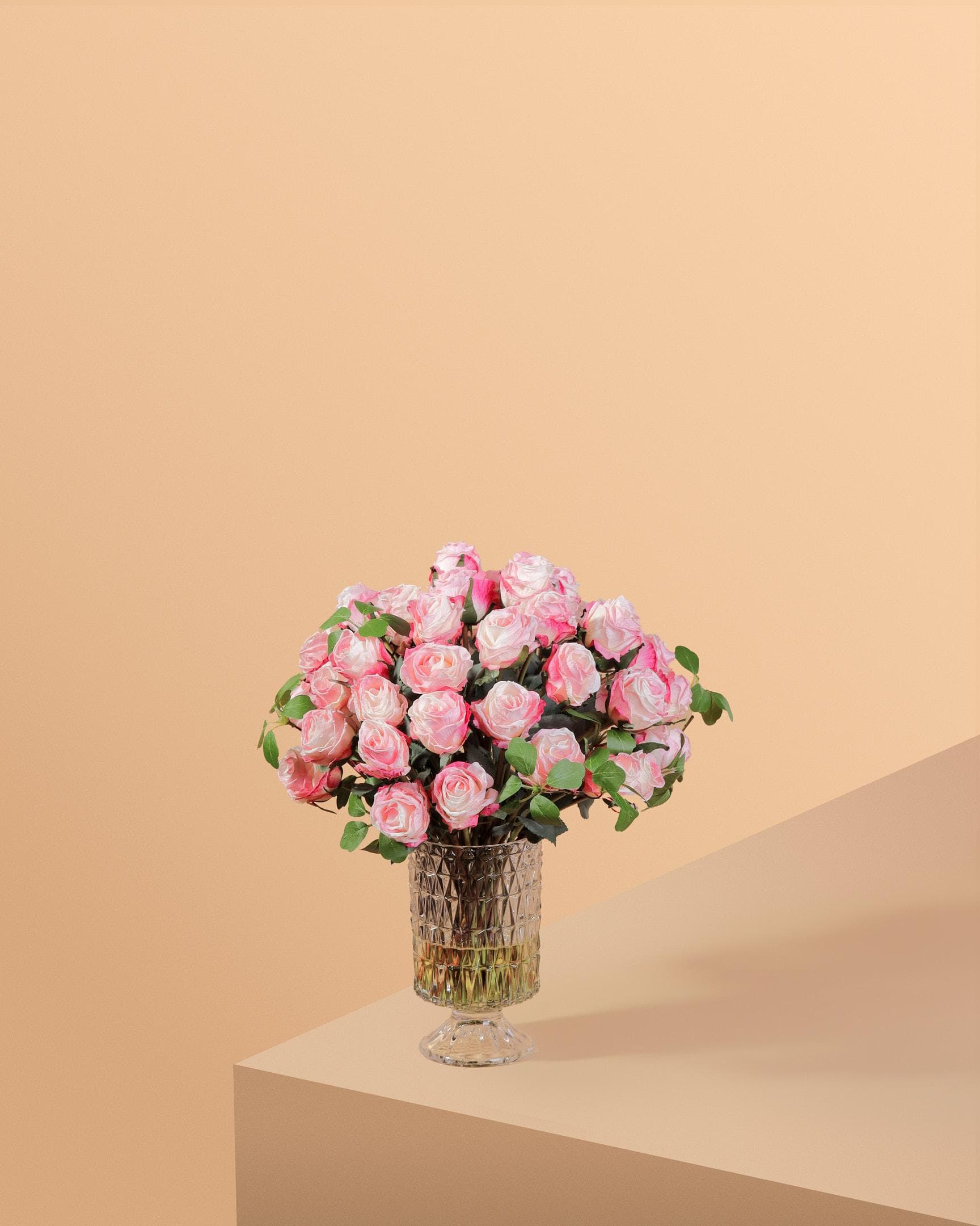 Mid rose araangments in classic vase